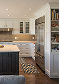 Renovated kitchen with corner pantry deleted, new cabinet pantry and large island with back to back storage